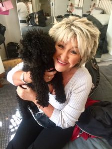 Maggie Oliver with a dog